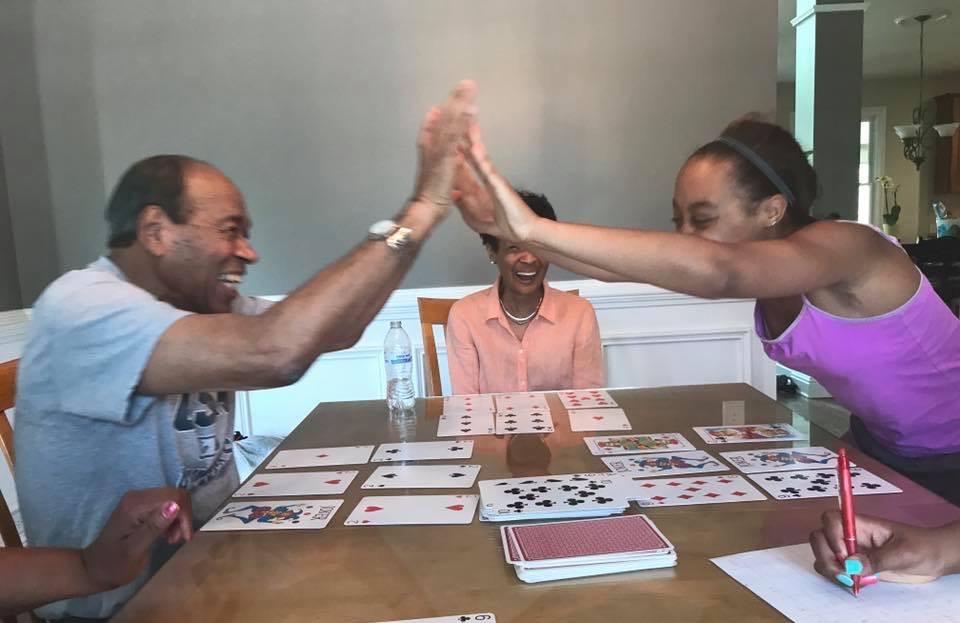 Niaya teaching Opa how to be a card shark.