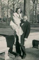 Lyman showing off his strength to impress his sweetheart, Grace.