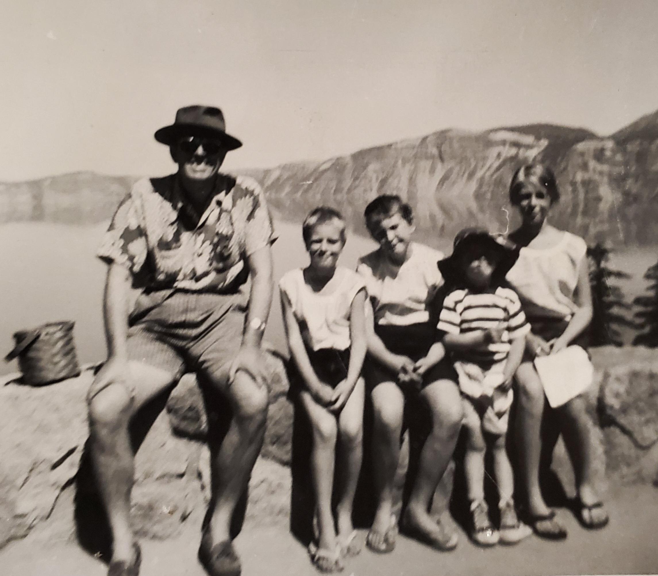 Another family camping trip- I think this is Crater Lake in the background. That was the year my; father cut my hair off super short so lucky Carole and Sandy got haircuts too. 