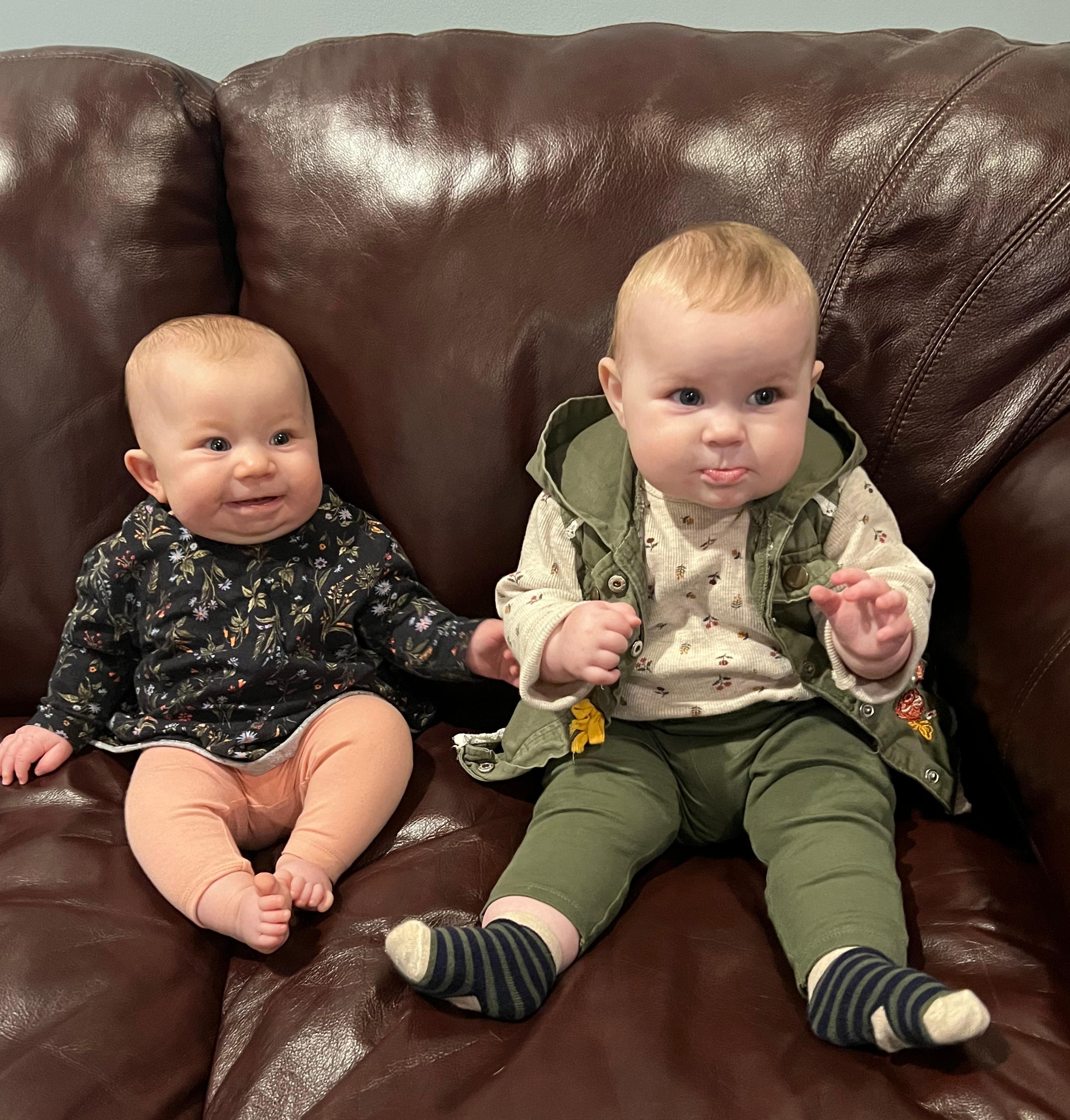 Isla and Nellie! Same couch, just a little bigger.