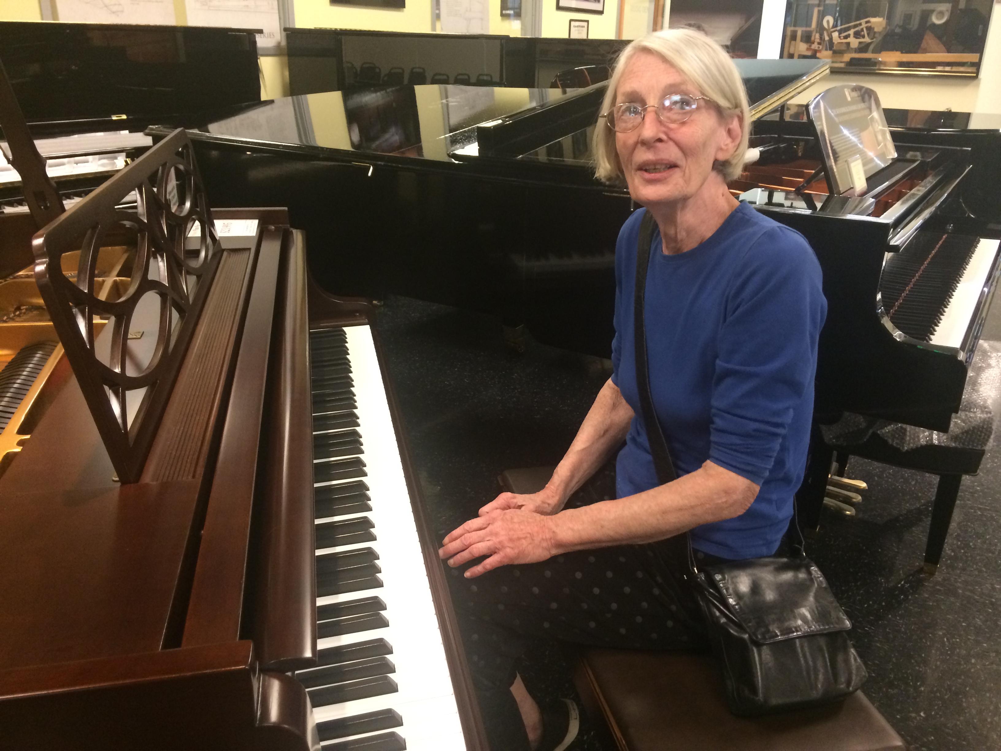 Mom at the piano store. She played around on various painos. 2016 LA visit.