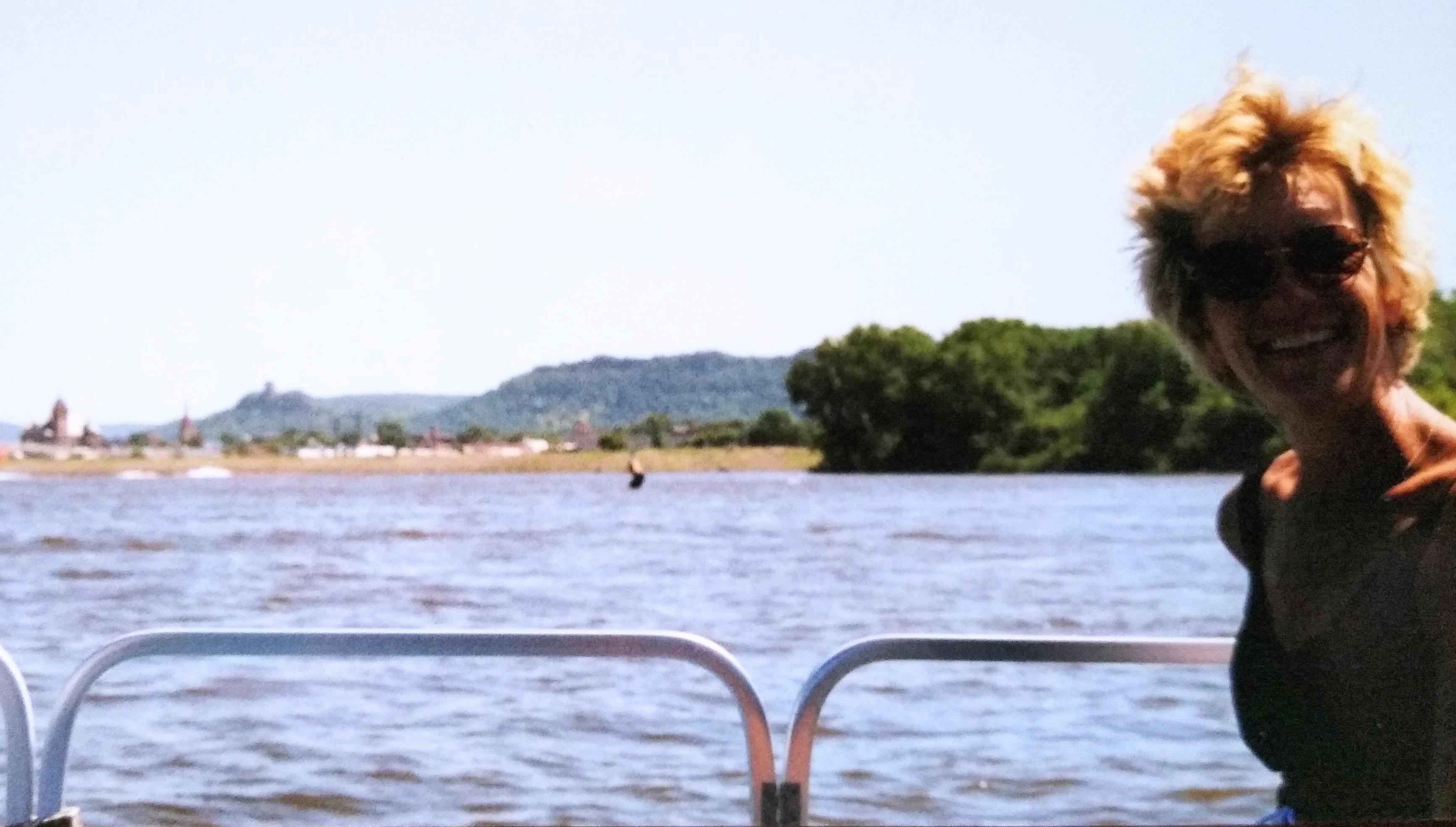 Molly loved pontooning on the Mississippi.  Winona and Sugar Loaf are just visible in the background.