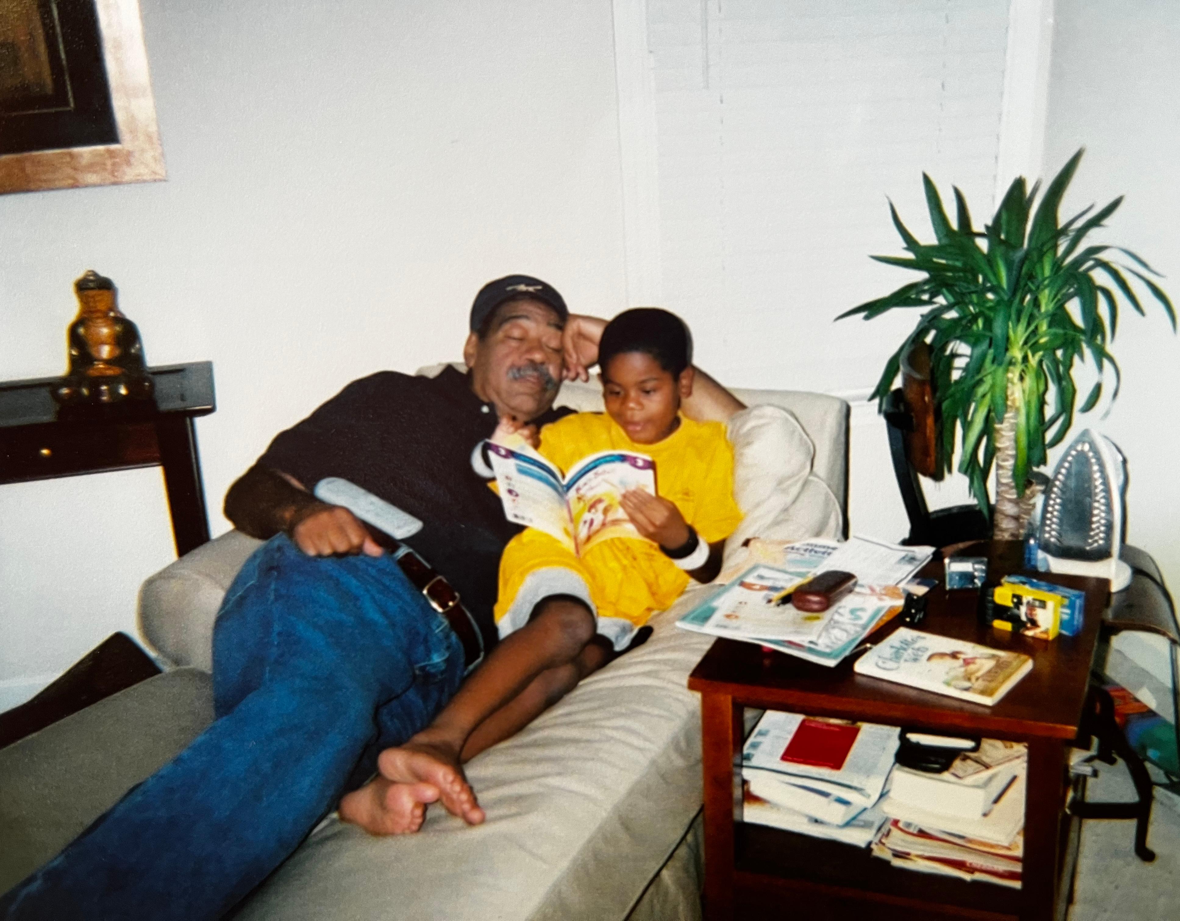Opa and his grandson Kyle reading a book