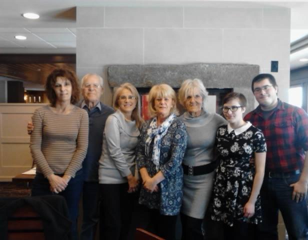 Family photo. Left to right: Margaret Lemire, daughter; Uncle Mog, brother; Kathy Rusch, daughter; Sue Pich, niece; Bird; Hannah Rusch; granddaughter; Pierce Sofko, grandson by marriage