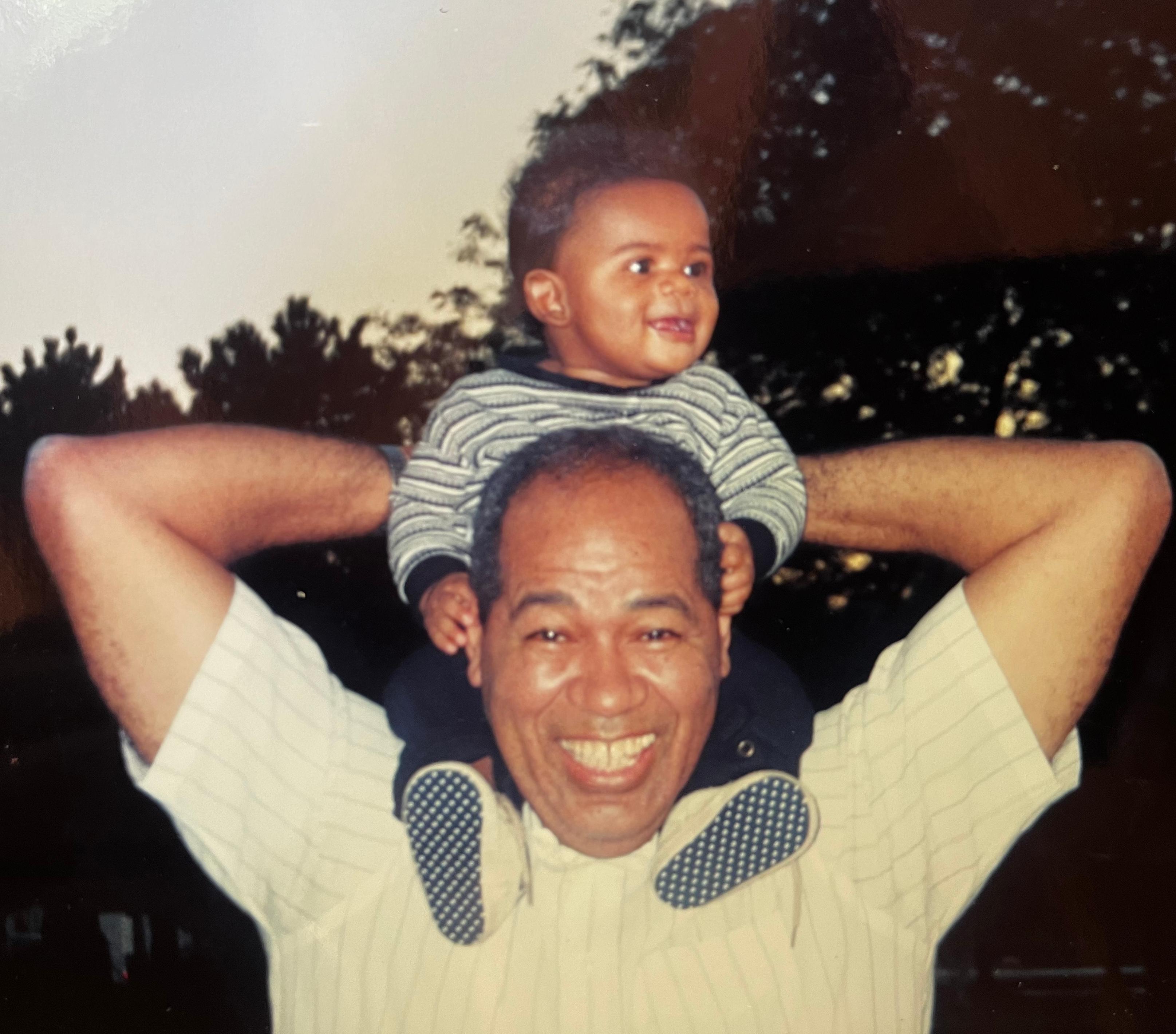 Opa carrying his grandson Kyle on his shoulders