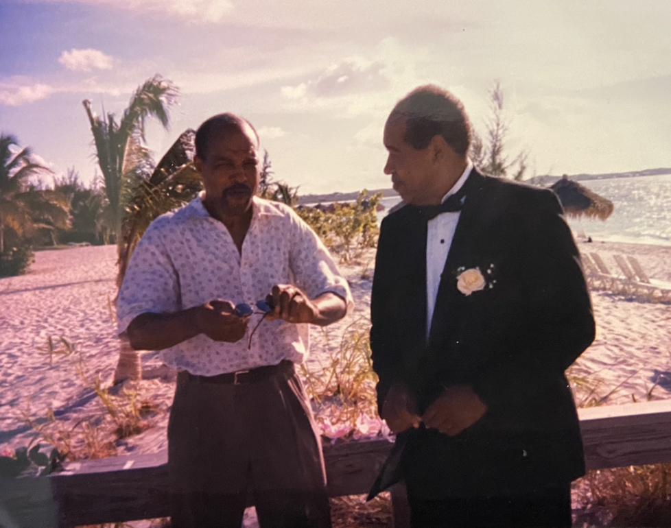 Dad and Uncle Nat having a chat before I walk down the aisle.