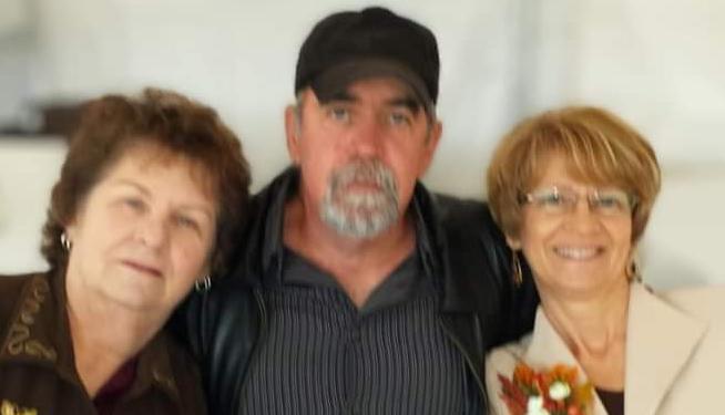 Judy with her brother and sister.