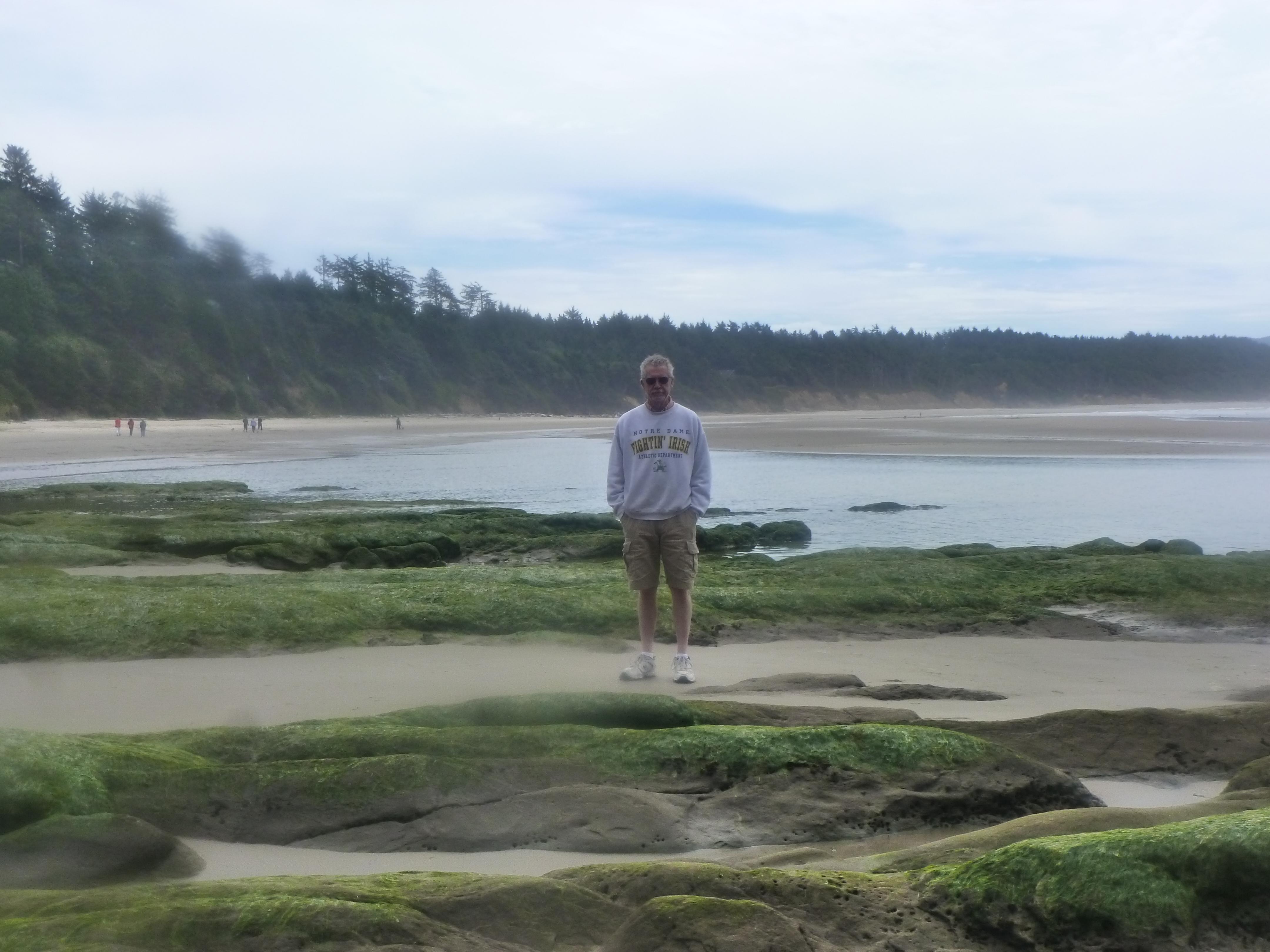 Tim on the Oregon Coast after Teresa and Shaun's wedding. Note the Notre Dame sweatshirt. One of the stories I remember from our youth was about Tim as a kid in his ND jacket. He must have been middle school age. The president of WIU (in our home town), Dr. Knoblach, had a propensity for putting up fences. We lived above the football stadium and were very unhappy about the high fence he had put up to keep us from sledding down the hill from our yard to the stadium parking lot. Until the fence went up, it was a good long ride down the hill. However, we all became great fence climbers to get to the other side and enjoy the stadium (and hill on the other side of the parking lot). One day, Tim was seen climbing the fence by Dr. Knoblach and he complained "that kid with the Notre Dame jacket is climbing over the fence." It was then communicated to our parents that he was not allowed to climb the fence. I don't think our parents gave a rip about us climbing over the fence and suspect they had a good laugh about it. He was definitely the only kid in town who wore a Notre Dame jacket so he was easily identifiable. Knoblach did not stop any of us from climbing the fence, but I think Tim became aware of the fact that the ND jacket was like a scarlet letter; only blue and gold. I'm pretty sure he didn't want to be so identifable.
