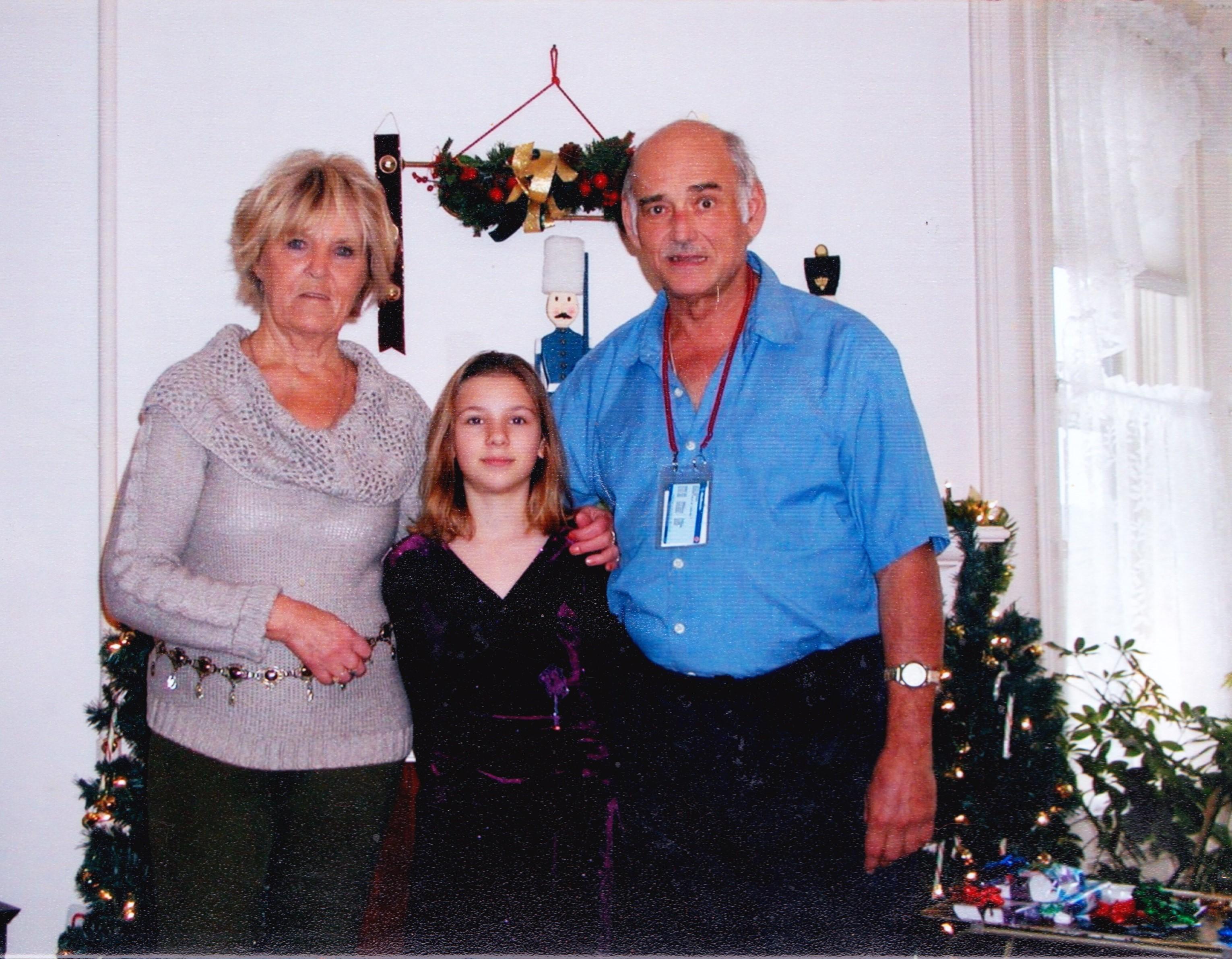Ed and Edna with Ed's granddaughter Brittney at the house in Hoosick Falls for Christmas around 2006.