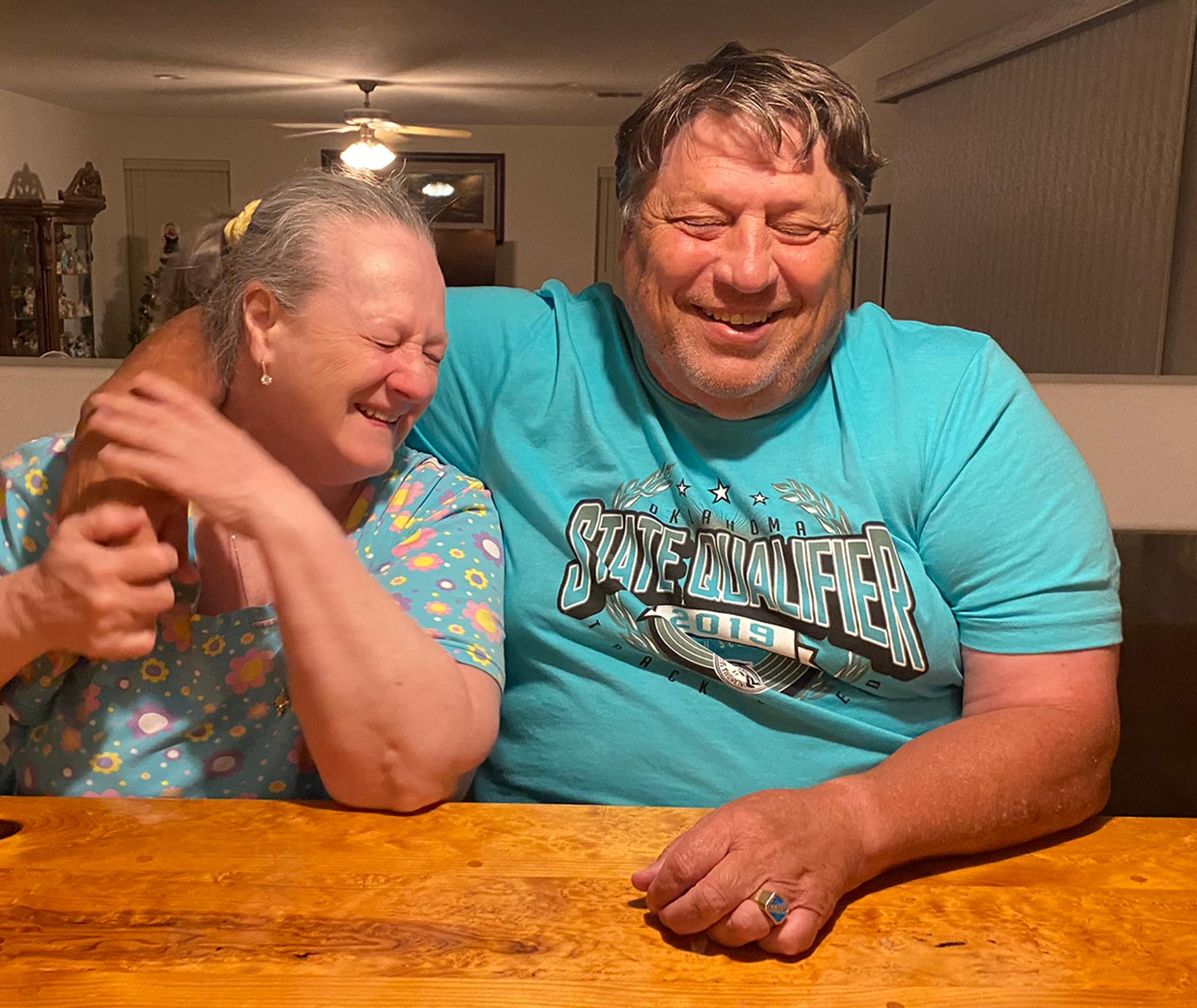 My mom asked me to take some photos of her and my dad on their 50th wedding anniversary. I have about 30 photos like this where they are goofing around with each other, and laughing. They're just the cutest. :)