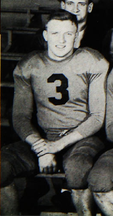 Lyman playing football at his college, Augustana