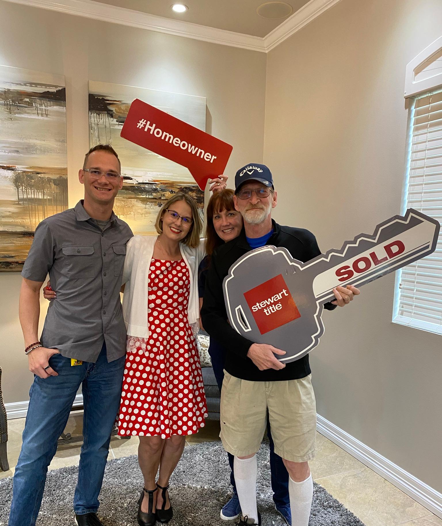 Craig and Jennifer with Dave and Stacy after they helped with the purchase of our first home