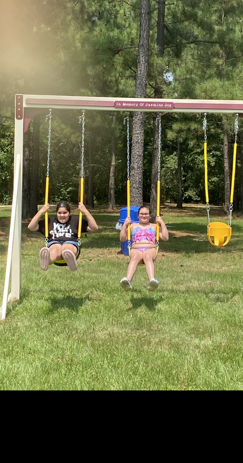 First two children to enjoy the swing shortly after installation on Aug 22nd 💕