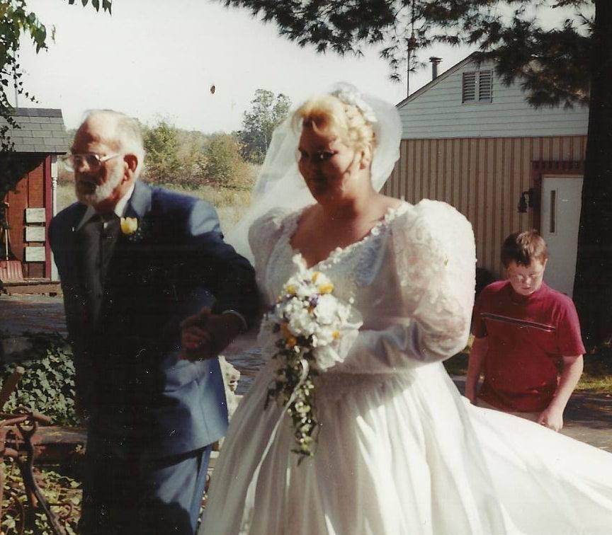 Delbert and Daughter Melissa October 14, 2000 at daughter's first wedding.