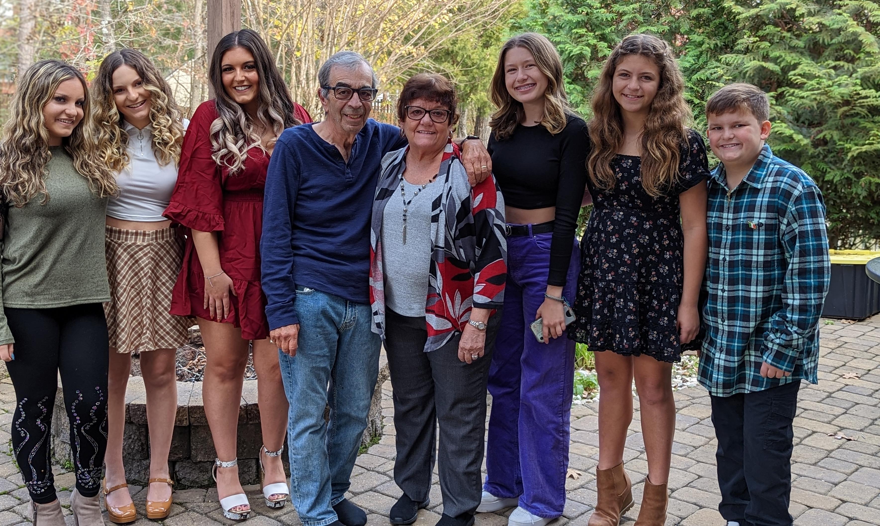 John & Carol with all their grandkids