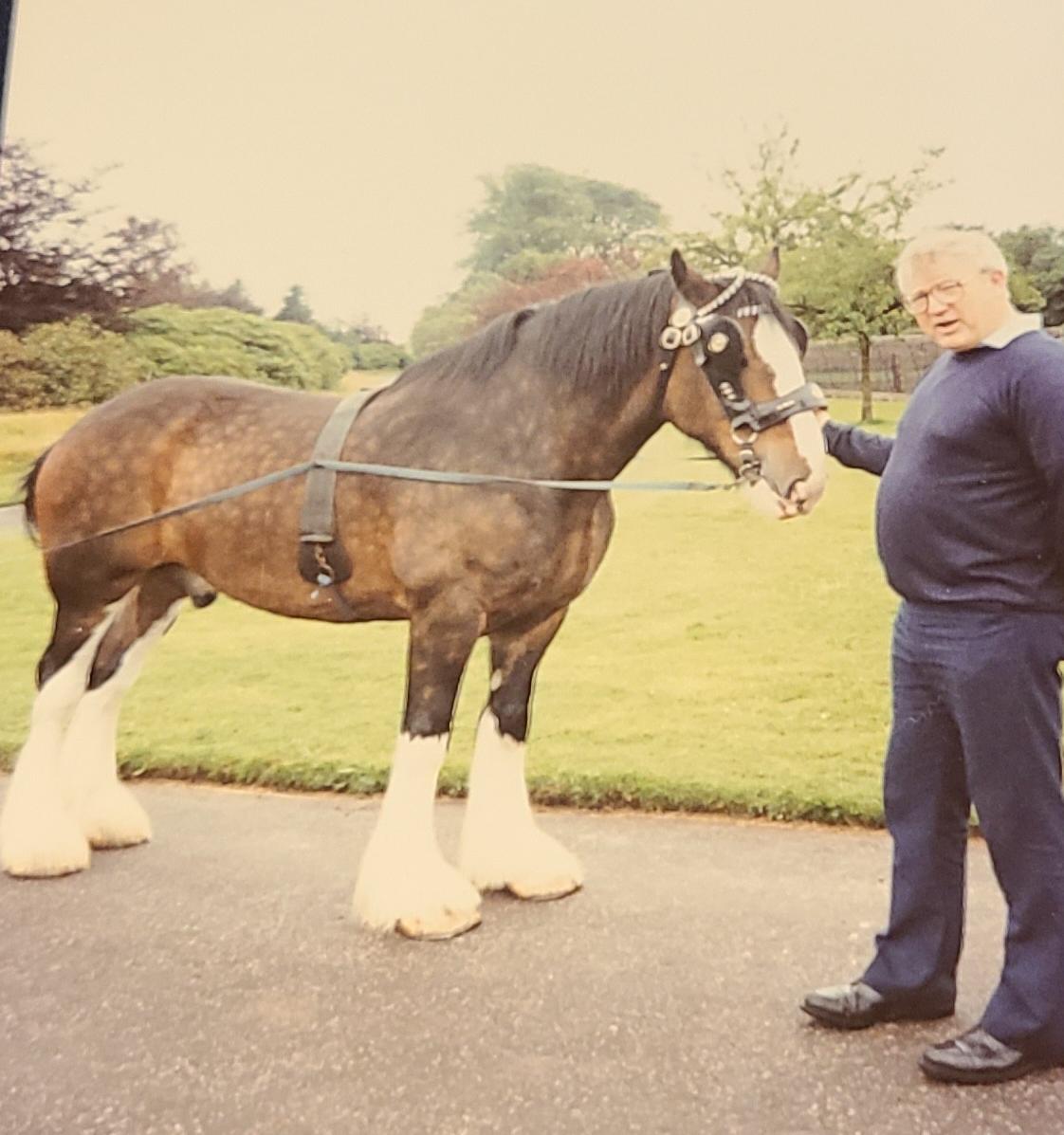 Dad with a draft horse.... he loved them!!!!