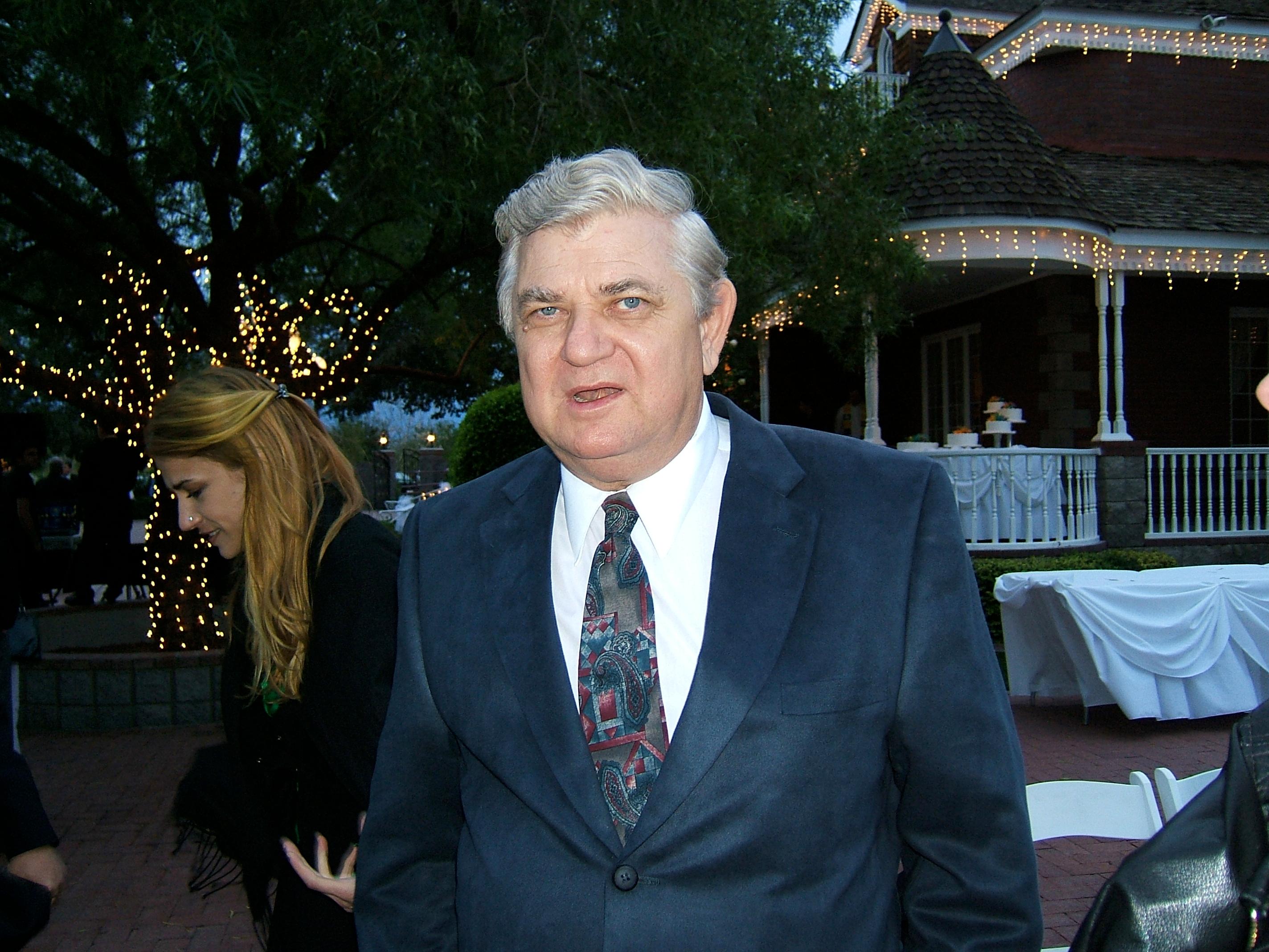 John Lee w/Lee, daughter, in the background