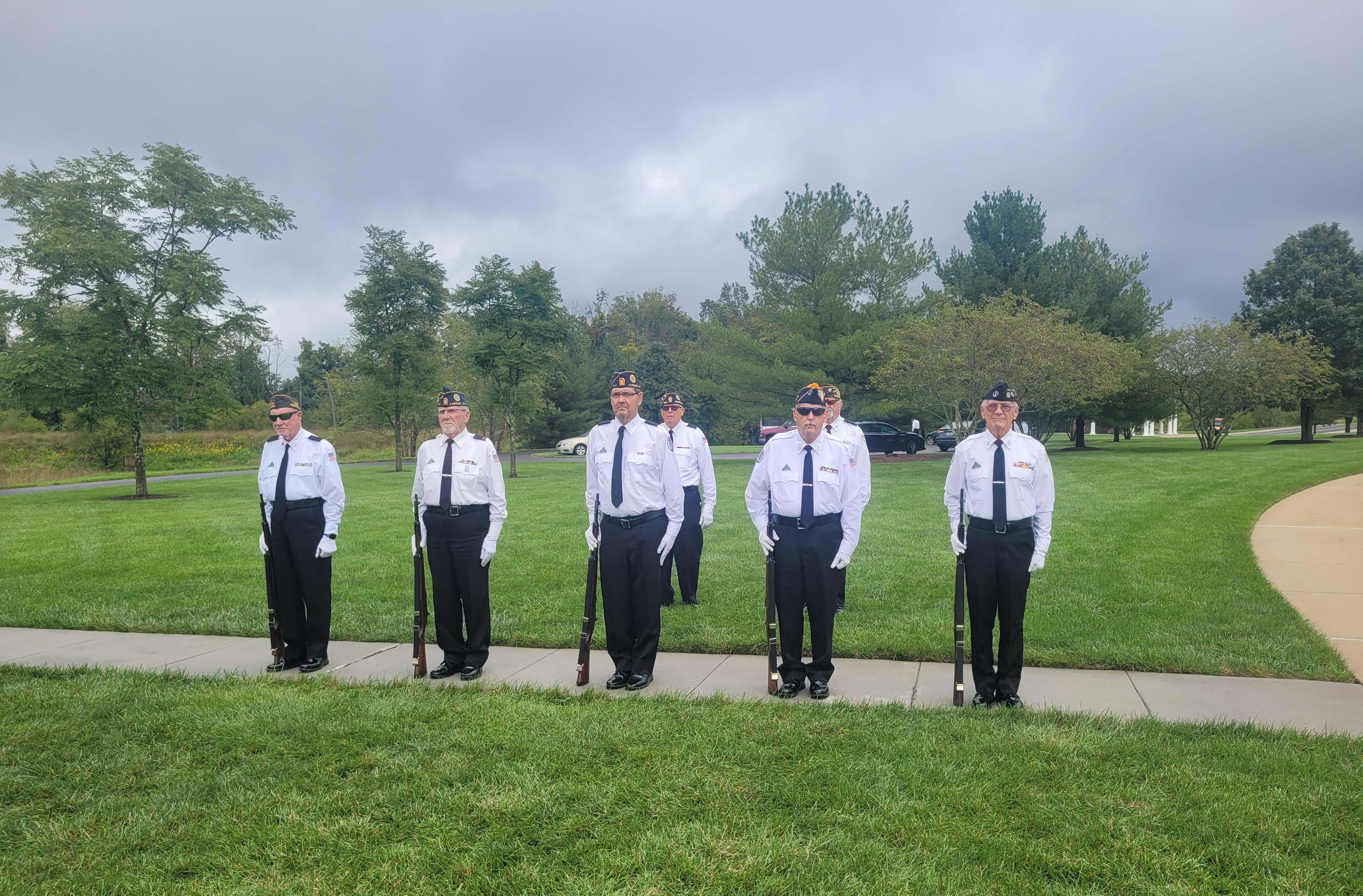 The American Legion prepared for the gun salute at the interment