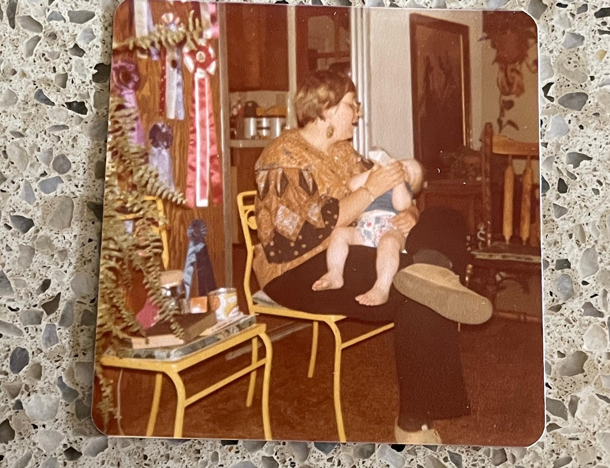 Carole feeding Baby Travis.