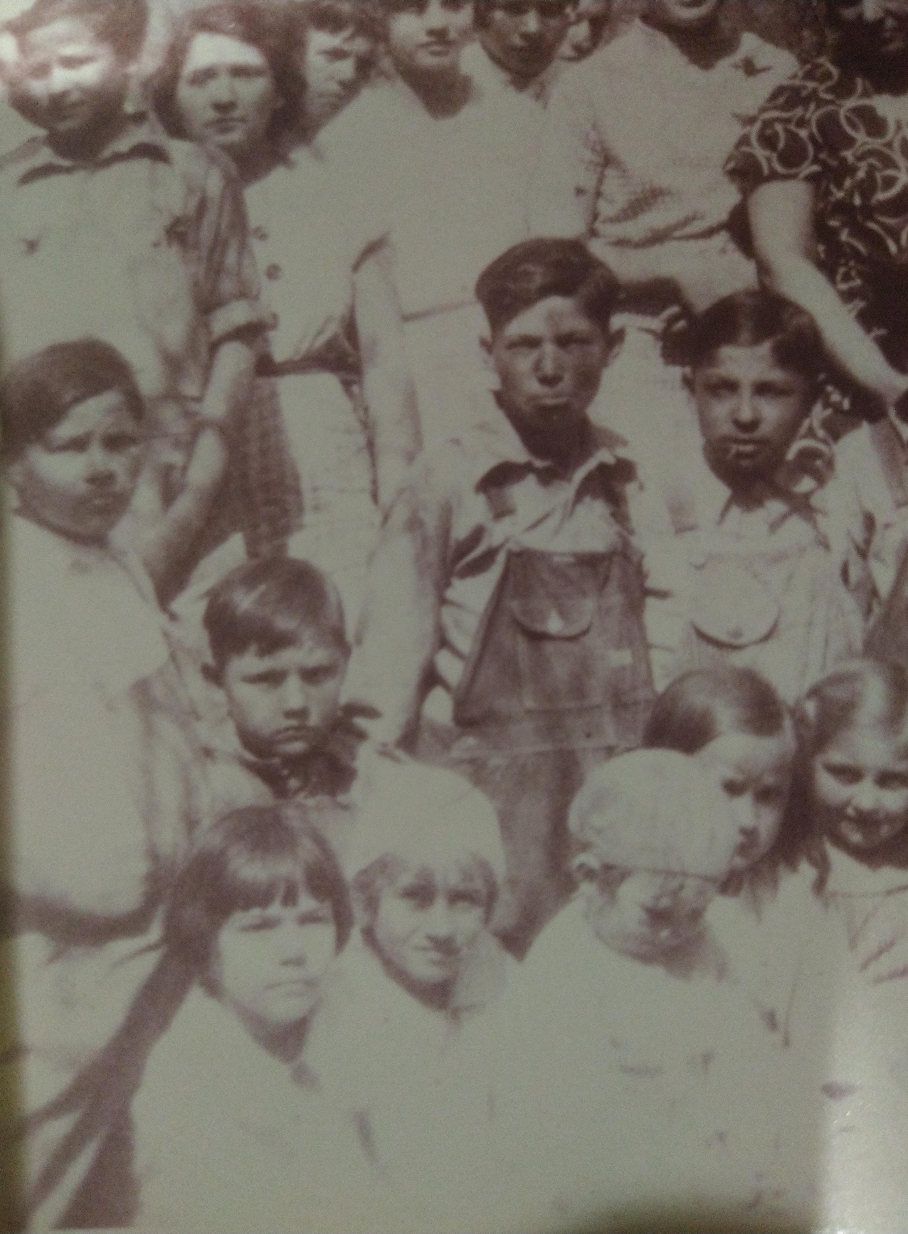 Lavern, bottom, dark hair, at Qualls School, about 1937.