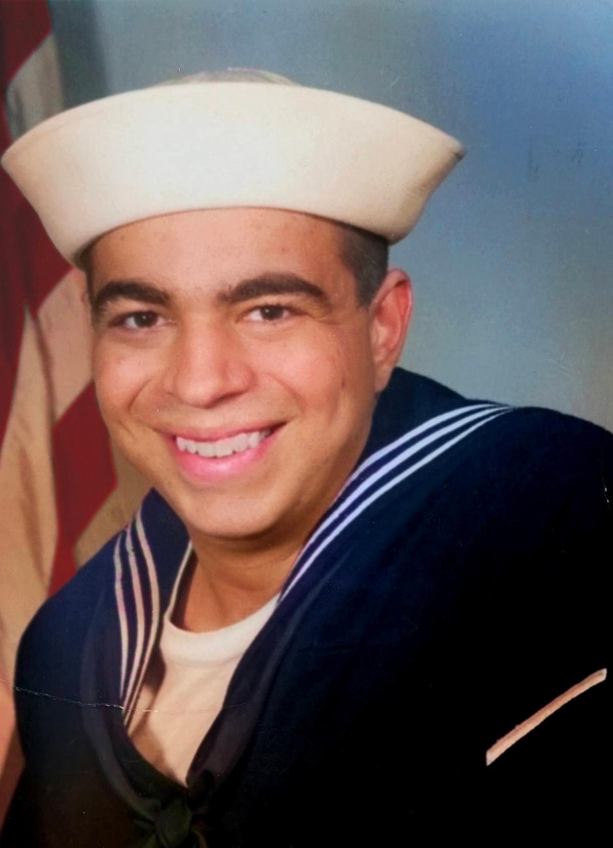 John serving in the US Navy from 1970-1973