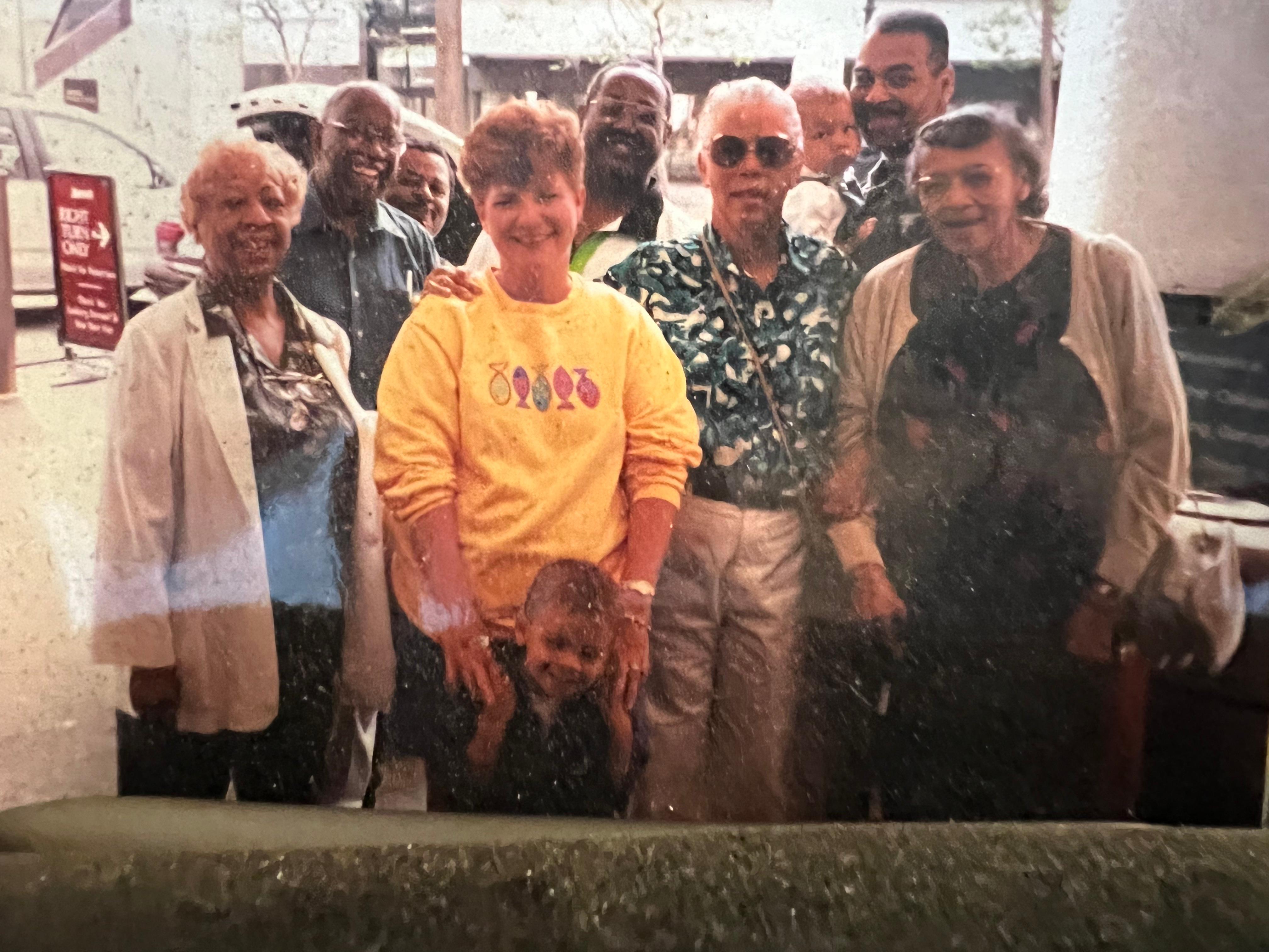 Joe (center) with family (Jean, Claire, Robert III, Neet, Eris, Robert Sr, Joe, Christian, Robert Jr.)
