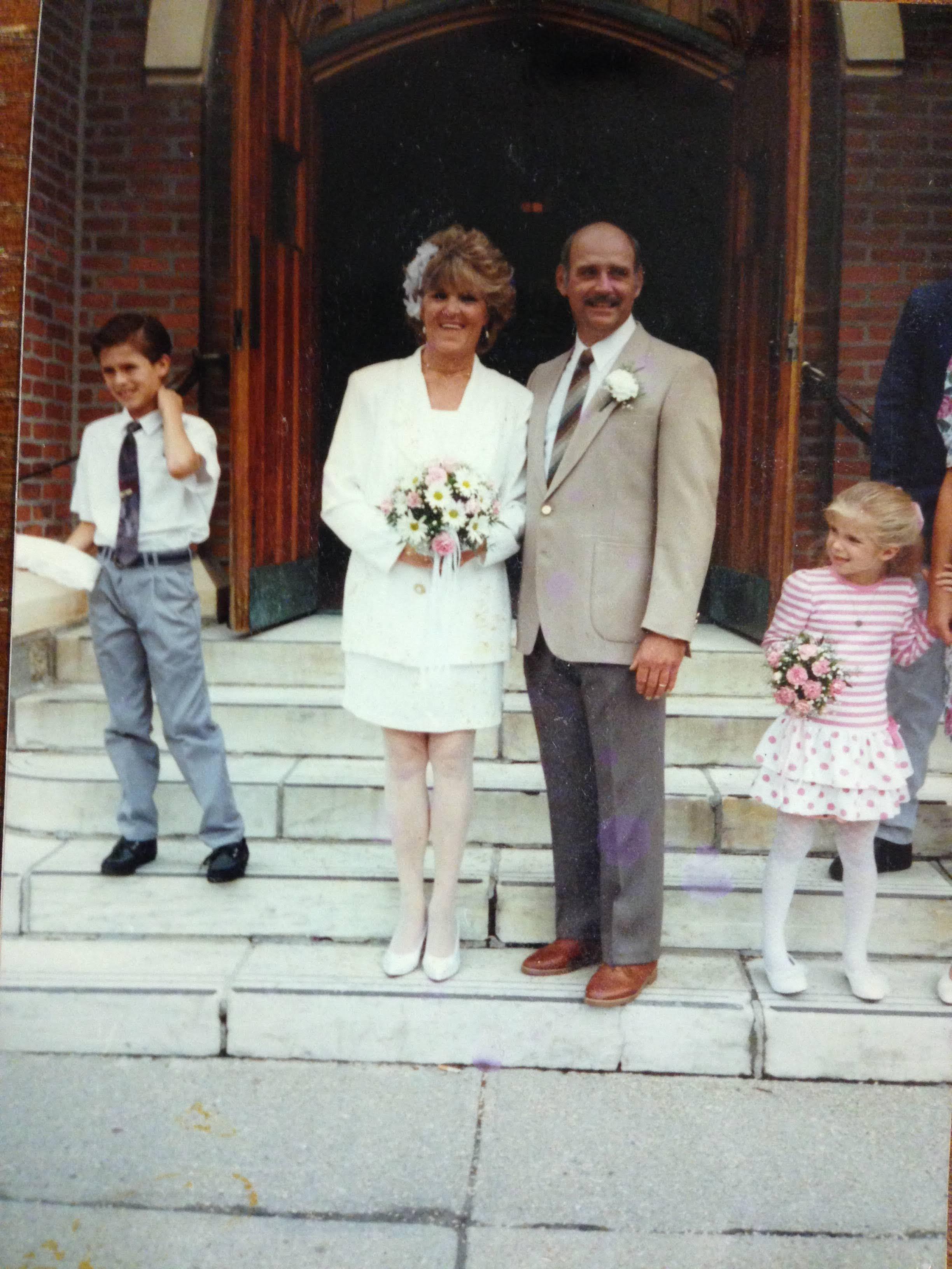Bird and Ed on their wedding day. Grandson Terrence on left, and granddaughter Carly on right