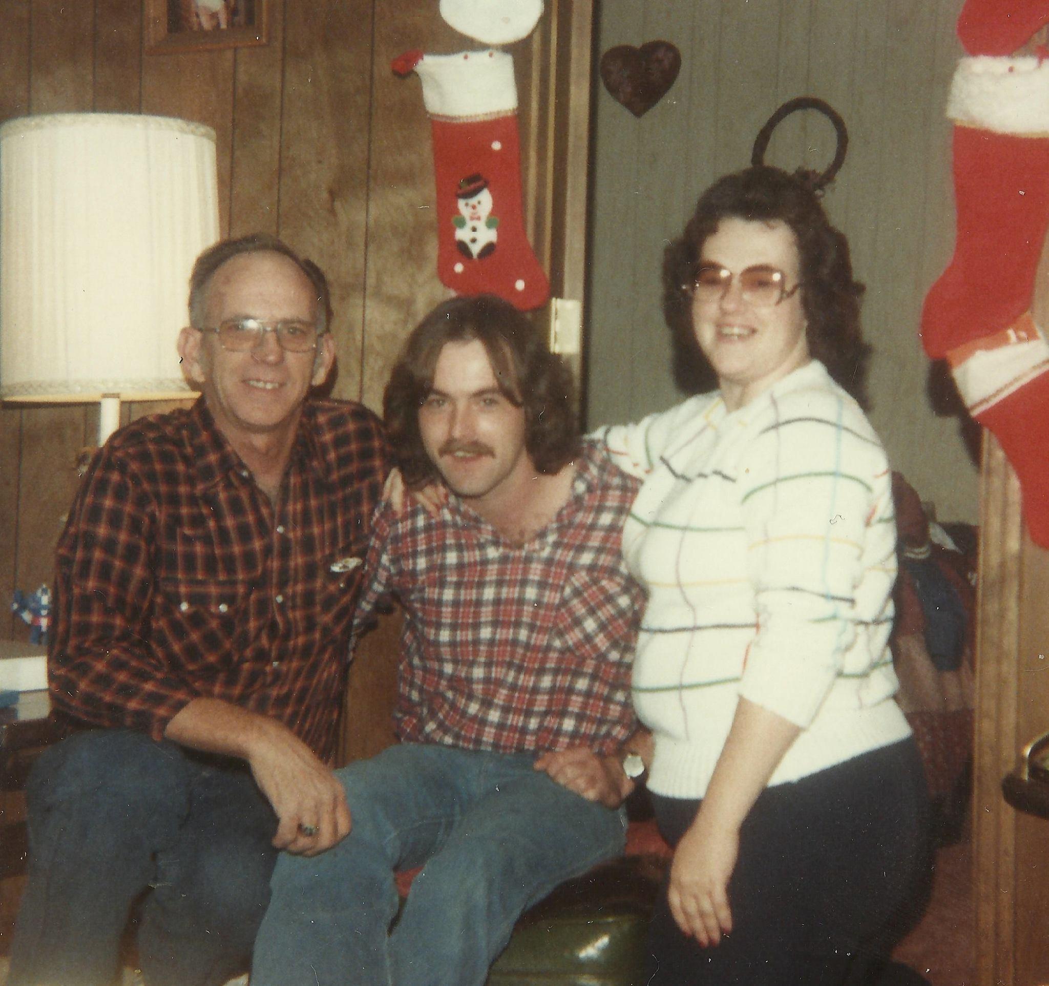 Delbert Urbain, son Troy and daughter Kathy.