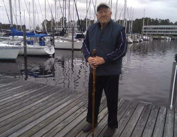 Lyman visiting his son, Bruce, and surveying the boats