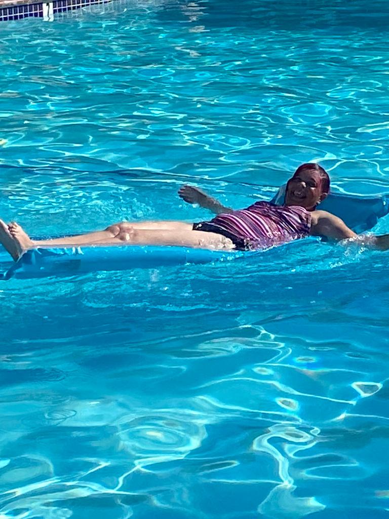Ashley with her birthday pool toys!