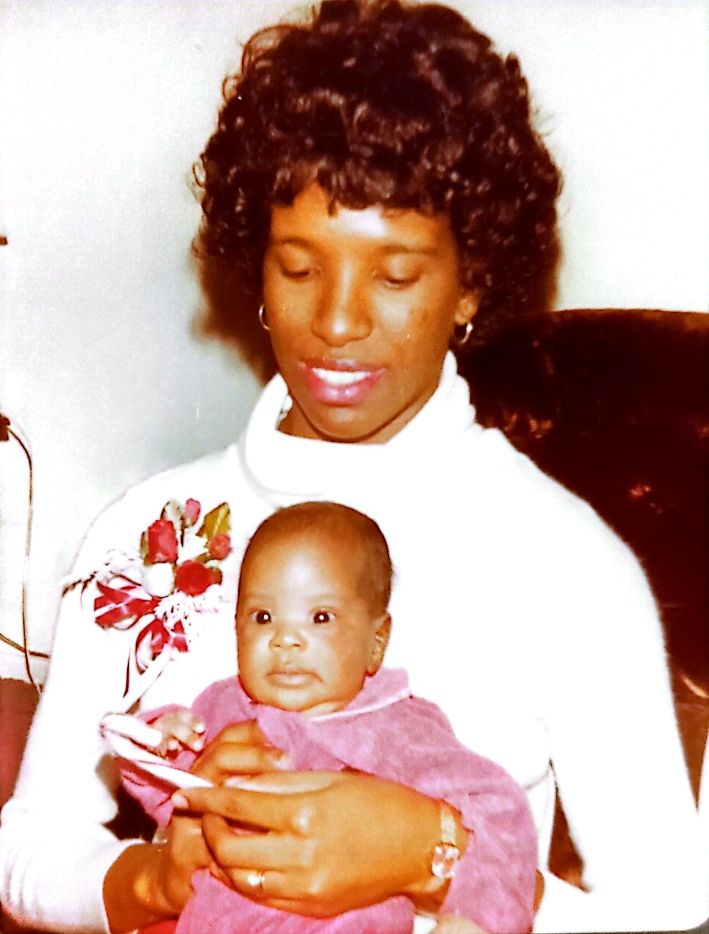 Mom's first Christmas as a mother with Marcia.