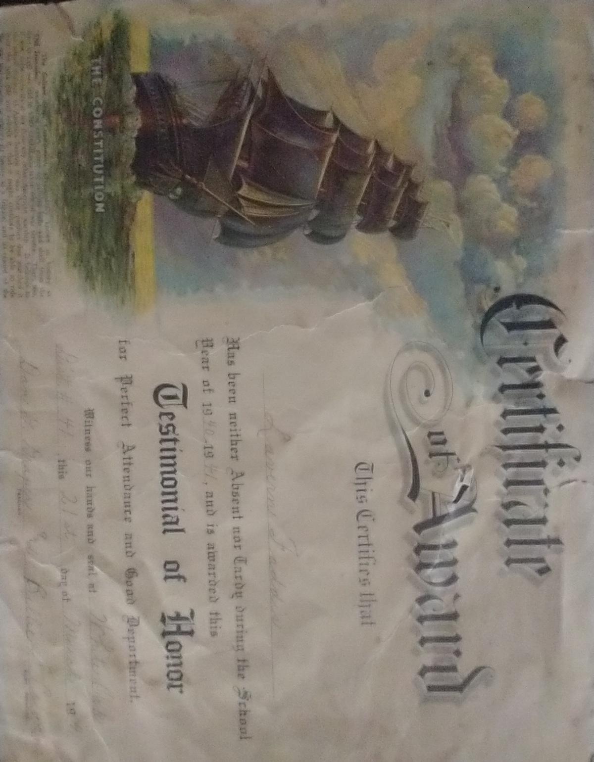 I found this school perfect attendance certificate for the 1940-1941 school year behind a picture in the frame.  The certificate has a photo of The Constitution, Old Ironside. Next picture is of the back of the certificate where it tells the story of the reconditioning of Old Ironside and how $400,000 was raised by children across the nation donating pennies.