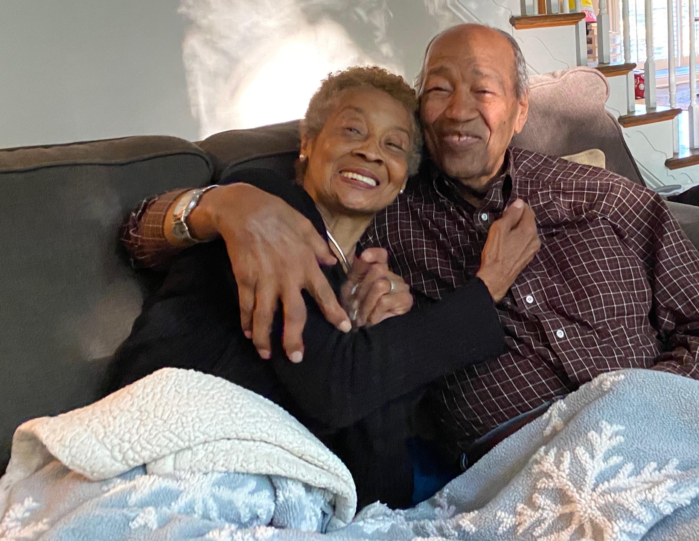 Mom and Dad cuddling