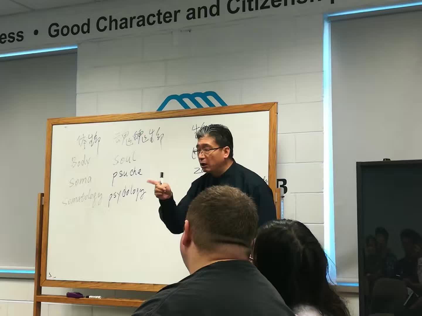 Pastor Bai giving our sermon