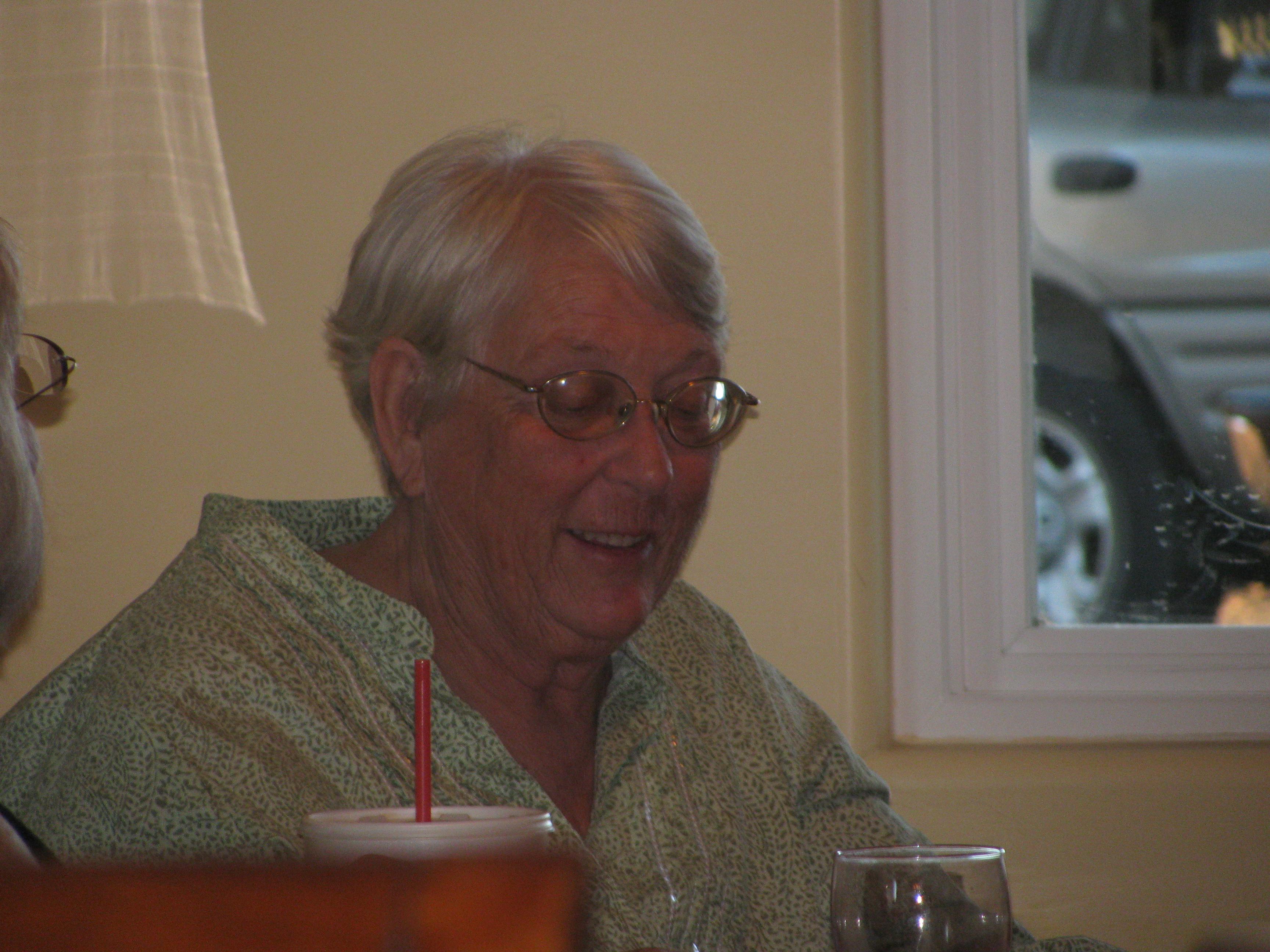 Carole enjoying conversation and dinner at Wes and Lora's.