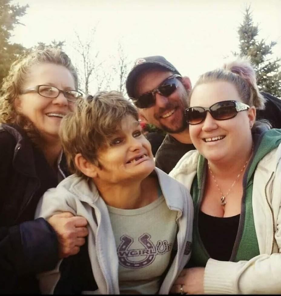 Having fun shopping for a Christmas tree.